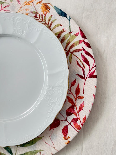 Funda bajo plato estampado primaveral